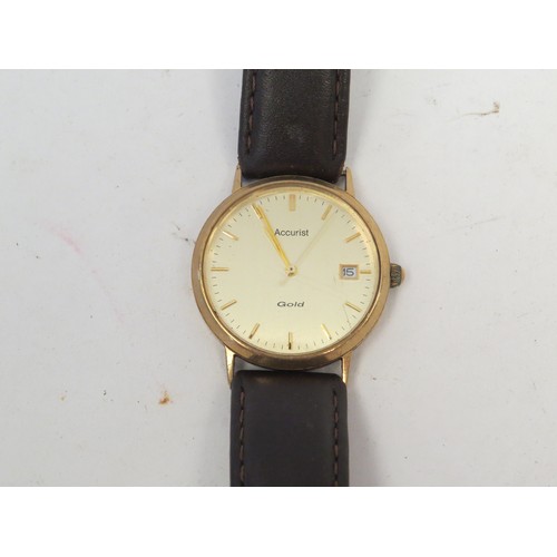 1071 - A 9ct gold cased Accurist wristwatch with brown leather strap