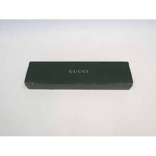 1085 - A Gucci stainless steel wristwatch, model No. 545P. Boxed with booklet.