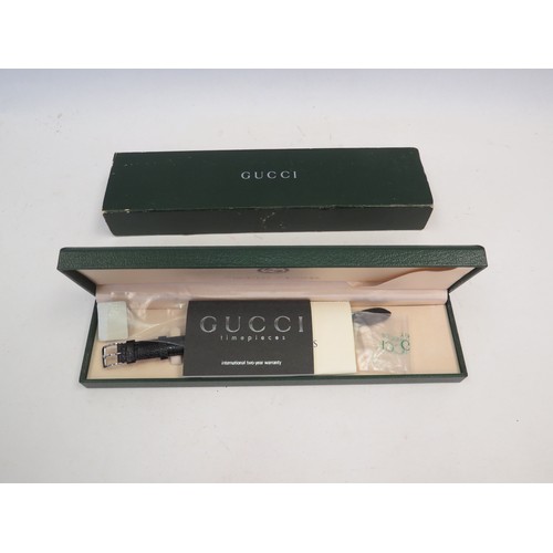 1085 - A Gucci stainless steel wristwatch, model No. 545P. Boxed with booklet.