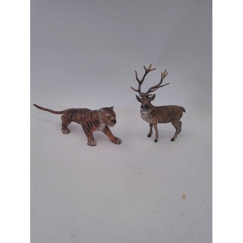 1500 - A painted cold cast bronze Lion and Stag