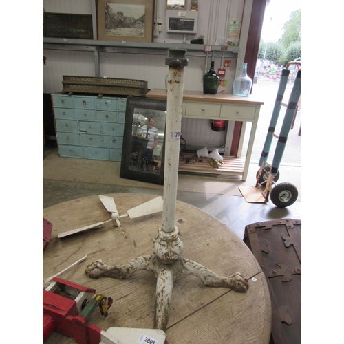 2004 - A cast iron table base with claw feet