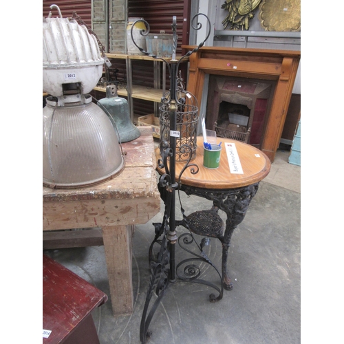 2010 - A wrought iron chapel lamp stand