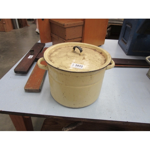 2032 - A yellow enamel pot and lid