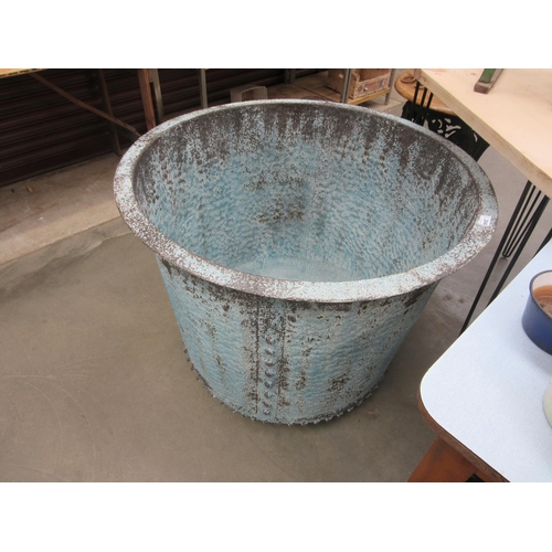 2040 - A substantial metal planter or log bin with verdegris copper effect finish, 97cm diameter x 76cm tal... 