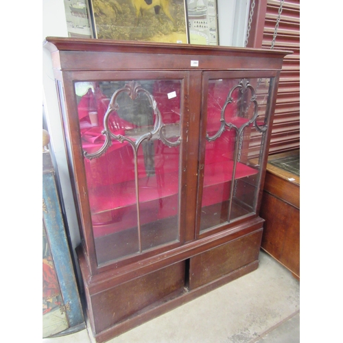 2081 - A Victorian mahogany glazed cabinet over cupboard