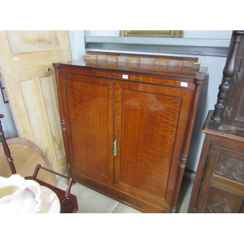 2094 - A 19th Century mahogany two door house keepers cupboard, pillar detail, sliding trays and drawers to... 