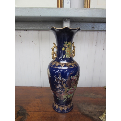 2117 - Two Oriental blue Peacock vases 41cm tall