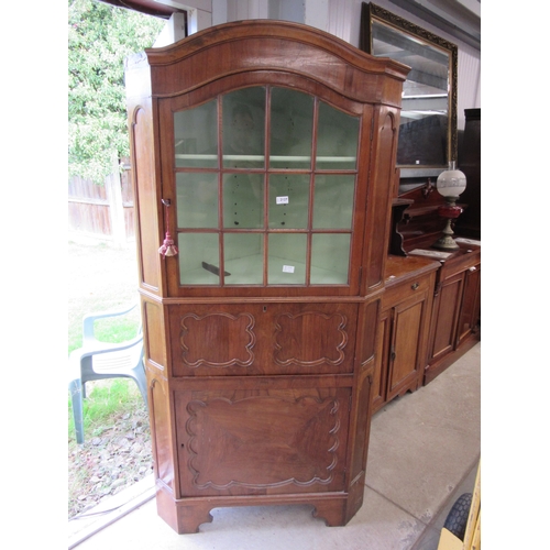 2127 - An 18th Century style walnut corner cabinet, astragal glazed top over a fall front with writing surf... 