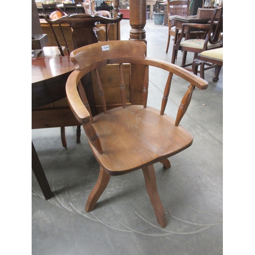 2142 - A 1940's oak Captain's chair