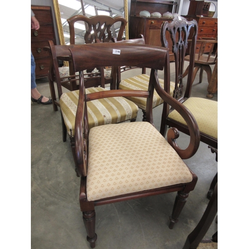 2146 - A Victorian mahogany scroll arm carver chair