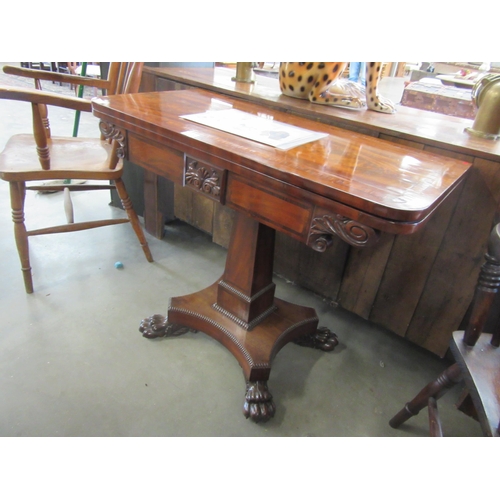 2155 - A 19th Century flame mahogany card table with cross-banded top, over column support to large paw fee... 