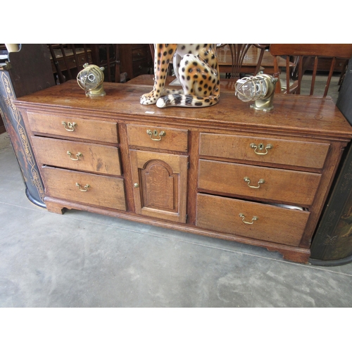 2158 - A Georgian oak sideboard dresser base