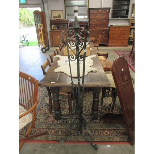 2164 - A wrought iron blacksmith made standard lamp