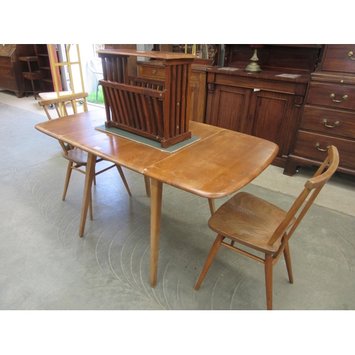 2177 - An Ercol rectangular drop-leaf table and two chairs, 133cm long x 73cm wide