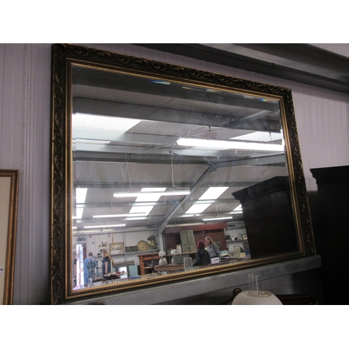 2181 - A large gilt framed mirror with bevelled edge glass 105cm x 130cm