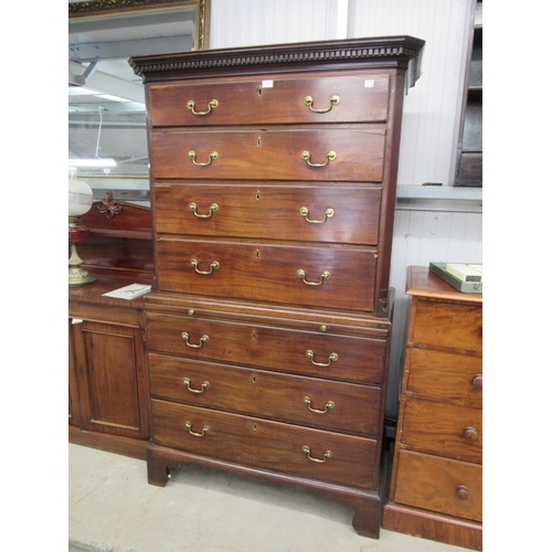 2187 - A George III mahogany chest on chest with brushing slide, areas of damage present to drawer edges,  ... 