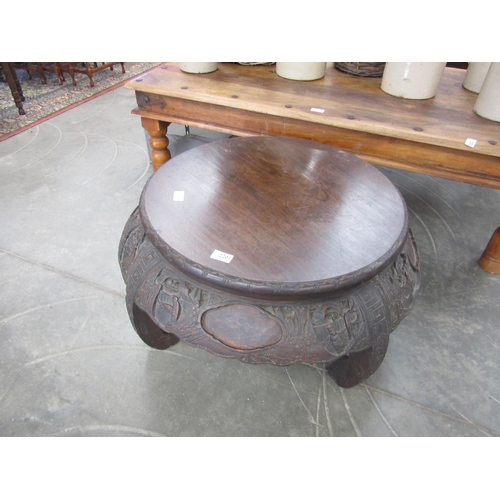 2201 - An Oriental carved hardwood coffee table with figural scenes and vacant cartouches