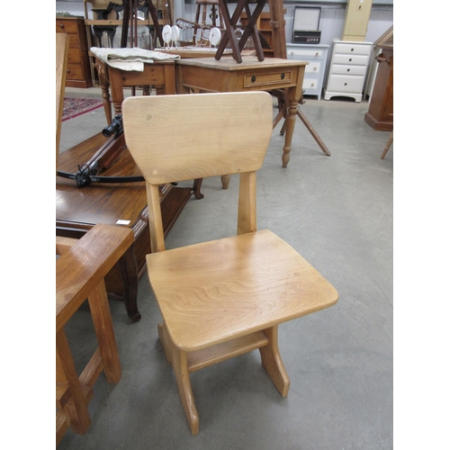 2204 - Two Mid century light oak chairs