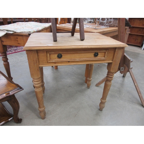 2209 - A pine side table with one drawer