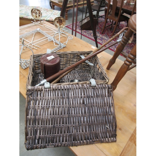 2215 - A wicker basket, walking sticks and drinks set