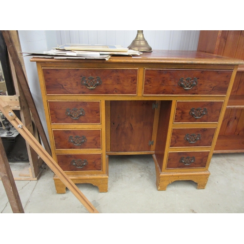 2220 - A Queen Anne style oak and burr walnut knee hole desk