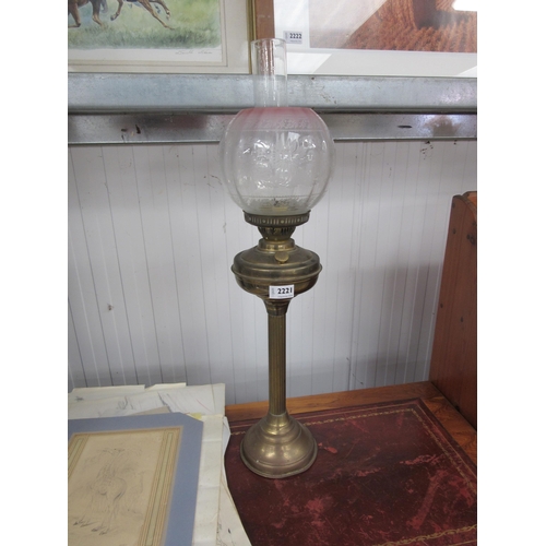 2221 - A brass oil lamp with shade and funnel