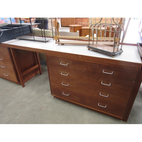 2282 - A mid Century Remploy dressing table with two over three chest of drawers to side and mirror inside ... 