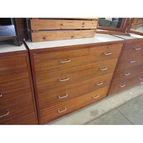 2320 - A Remploy mid Century two over three chest of drawers with mirror in drawer