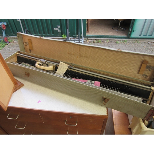 2324 - A knit master knitting machine