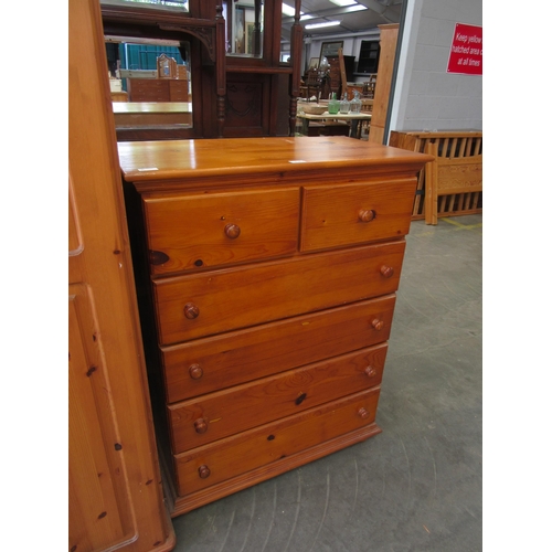 2363 - A modern pine chest of two short over four long drawers