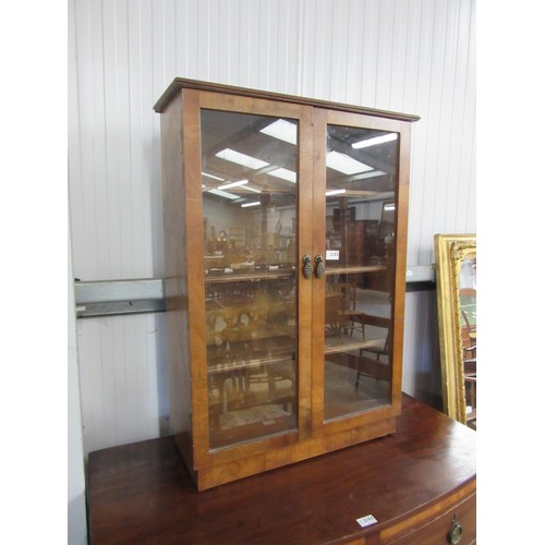 2102 - A Victorian walnut glazed low bookcase