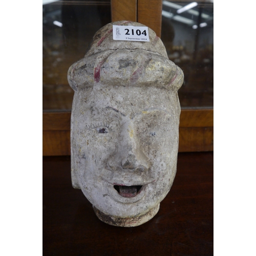 2104 - A 19th century Burmese carved wooden puppet head with sticky out tounge