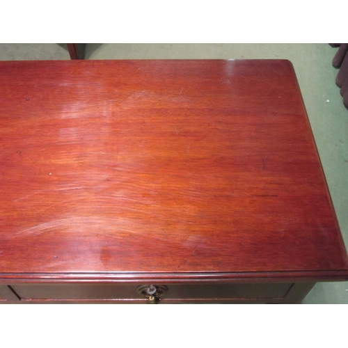 4001 - A Georgian mahogany side table, the two frieze drawers with line inlay over square tapering legs, 72... 