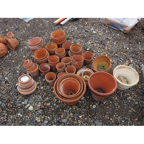 3534 - A quantity of terracotta pots including hand-thrown examples (approx. 54)