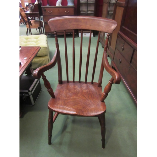 4115 - A circa 1860 elm and ash stick-back Windsor armchair (stamped C.M.) on ring-turned supports and legs... 