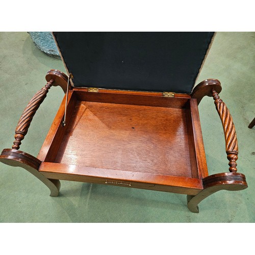 4120 - A Georgian mahogany upholstered hinged seat stool with carved rope-twist handles on reeded, scroll t... 