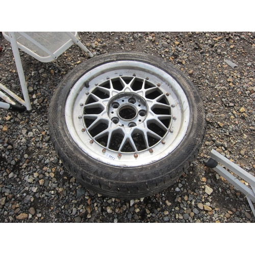 3552 - An alloy and steel wheel with tyre