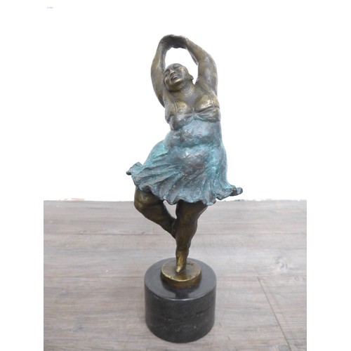 7128 - A bronze figure of a ballerina after Botero. Set on a marble plinth. 45cm high