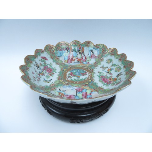 6261 - A late 19th Century Cantonese scalloped bowl on stand.  The interior decorated with birds, butterfli... 