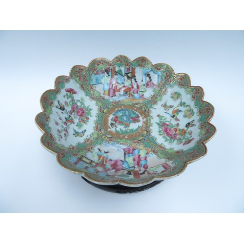 6261 - A late 19th Century Cantonese scalloped bowl on stand.  The interior decorated with birds, butterfli... 