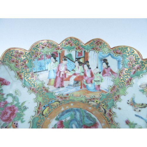 6261 - A late 19th Century Cantonese scalloped bowl on stand.  The interior decorated with birds, butterfli... 