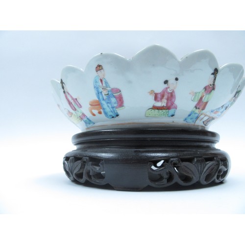 6261 - A late 19th Century Cantonese scalloped bowl on stand.  The interior decorated with birds, butterfli... 