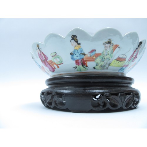 6261 - A late 19th Century Cantonese scalloped bowl on stand.  The interior decorated with birds, butterfli... 