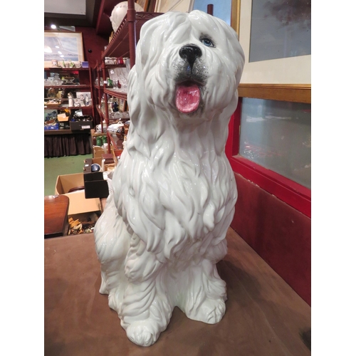 4010 - A floorstanding ceramic figure of an Old English Sheepdog, standing approximately 73cm high