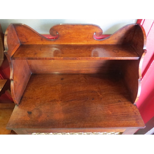 4021 - A Regency rosewood side cabinet the raised shelf back over a single door with brass lattice and plea... 