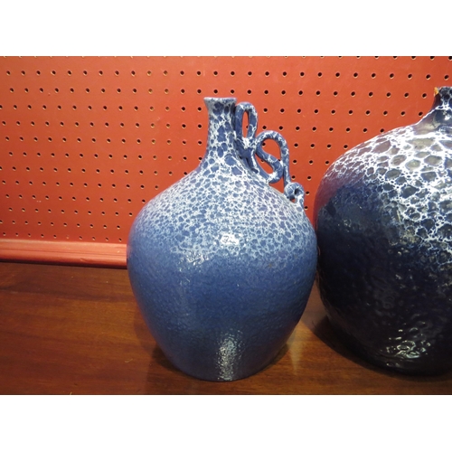 4026 - Three blue glazed pottery vases by Jose Caucoso de Souza, a pair of vases with handles and a larger ... 