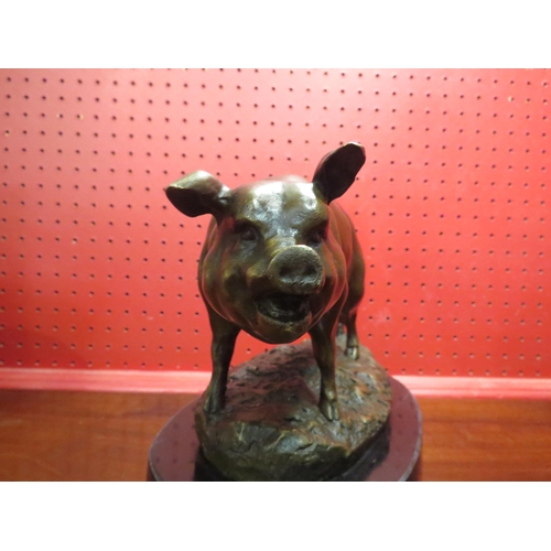 4027 - A bronze pig tethered to post, signed Balye, 30cm long