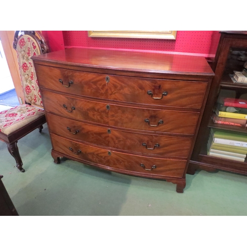 4028 - A circa 1840 flame mahogany bow-front chest of four drawers with brass swan-neck handles over ogee b... 