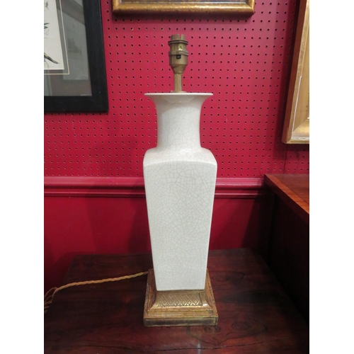 4052 - A celadon style vase shape table lamp on a decorative gilt base