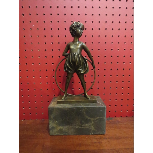 4054 - An Art Deco style bronze of a girl with hoop on marble base, signed Preiss, 26cm tall